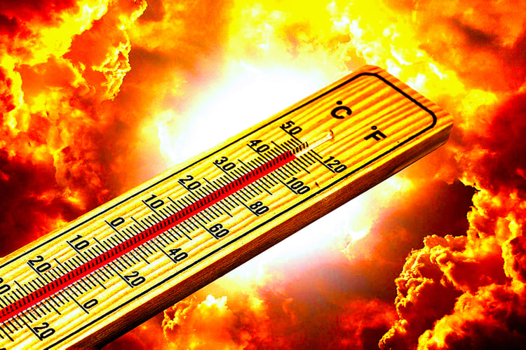 A thermometer showing high temperatures superimposed over a bright, shining sun and sky